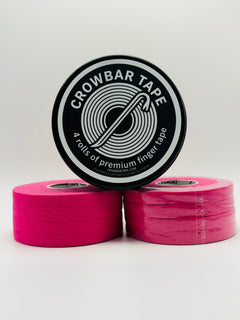Two 4-pack rolls of pink Crowbar Tape stacked on a light gray background, with a tin standing upright to show the black-and-white circular label that reads 'CROWBAR TAPE' and '4 rolls of premium finger tape '.