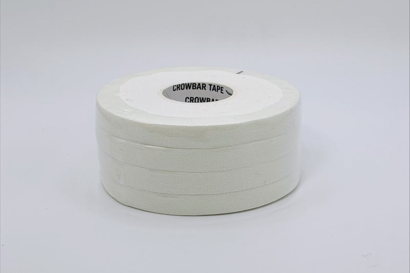 A roll of white crowbar tape with a whiteinner core, shown on a clean white background. The inner core has black text that reads 'CROWBAR TAPE CROWBAR'.